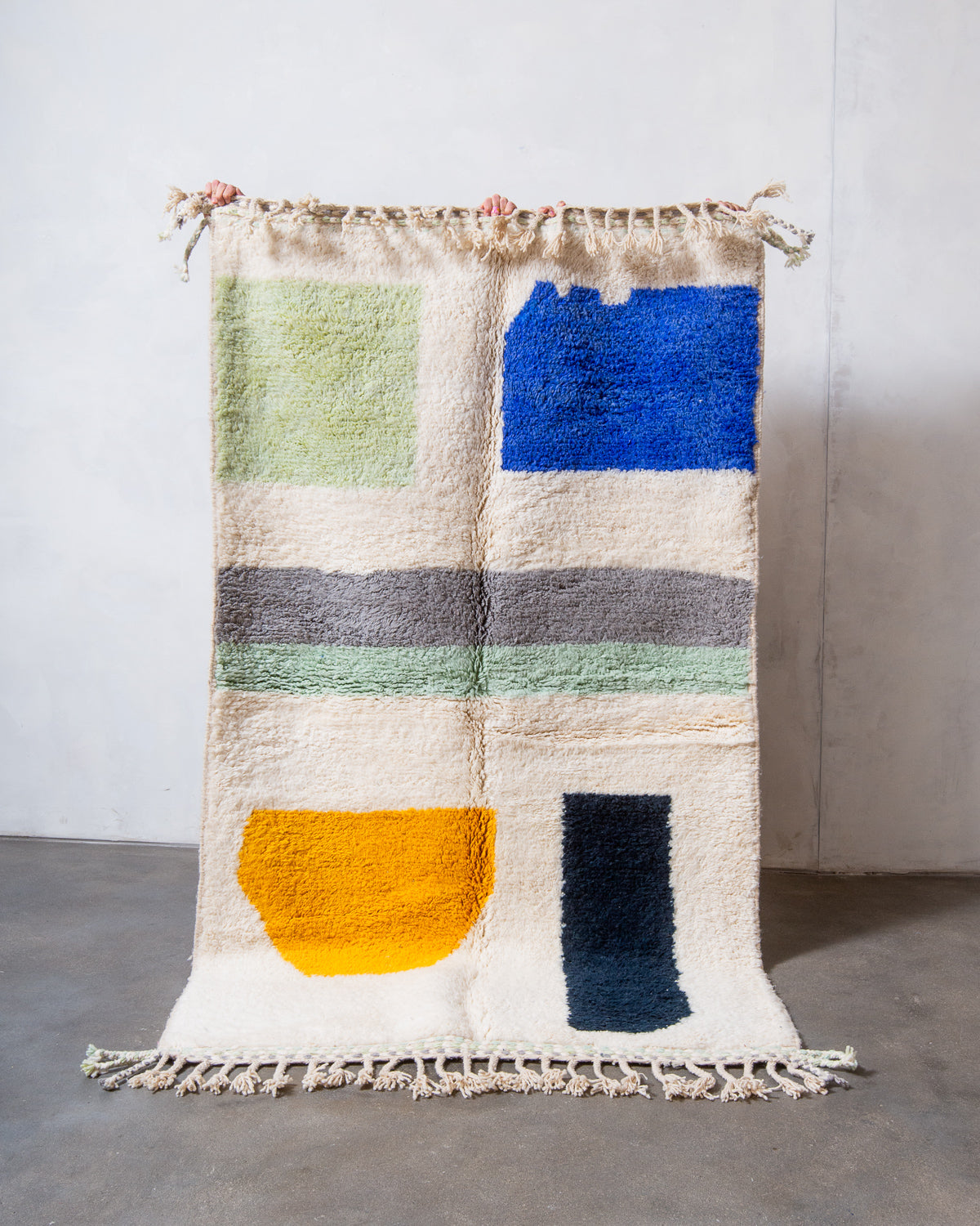 Modern, designer, handcrafted Berber rug from Morocco. Beniourain carpet with beautiful colours and patterns and fluffy wool texture.